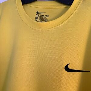 The Nike Tee Dri-Fit Men’s Size: 2XL Yellow Athletic Fit T-Shirt with Black Logo